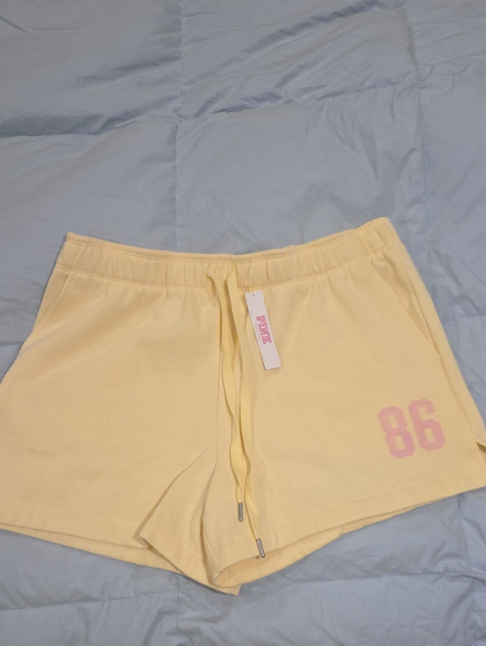 PINK Victoria's Secret Pale Yellow Drawstring Shorts with Pink 86 Accent